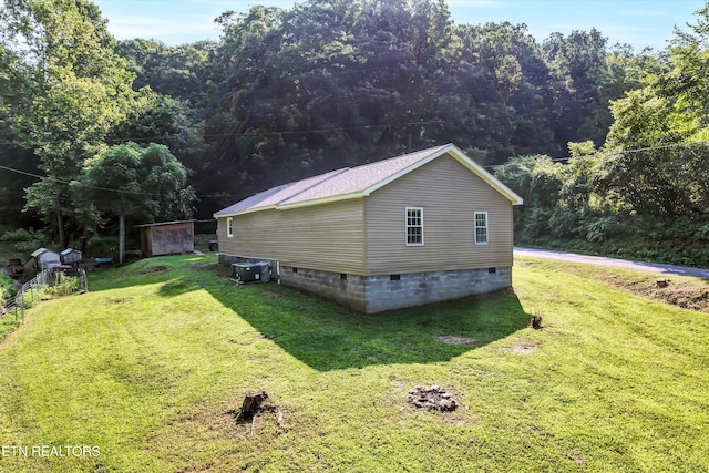 163 Ridge Rd, Sharps Chapel, TN 37866 - view of home's exterior featuring crawl space and a yard