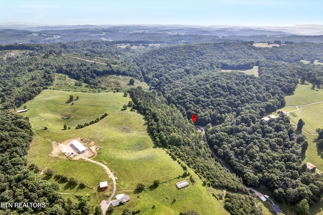 163 Ridge Rd, Sharps Chapel, TN 37866 - drone / aerial view of a heavily wooded area and a mountainous background