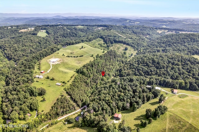 163 Ridge Rd, Sharps Chapel, TN 37866 - aerial view of property and surrounding area with a heavily wooded area and mountains
