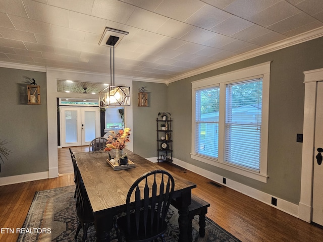 2824 W Cumberland Ave, Middlesboro, KY 40965 - dining space with ornamental molding, dark wood-style floors, and french doors