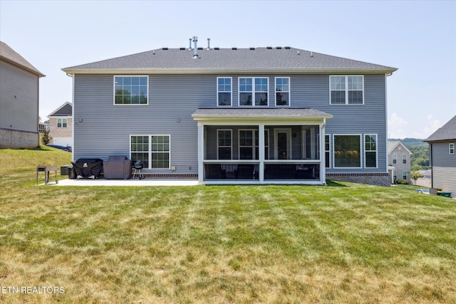 1682 Hickory Reserve Rd, Knoxville, TN 37932 - back of house with a patio, a lawn, and a sunroom