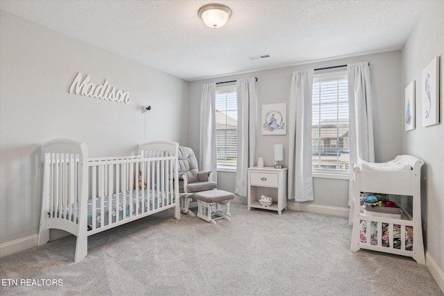 1682 Hickory Reserve Rd, Knoxville, TN 37932 - bedroom featuring carpet floors and a crib
