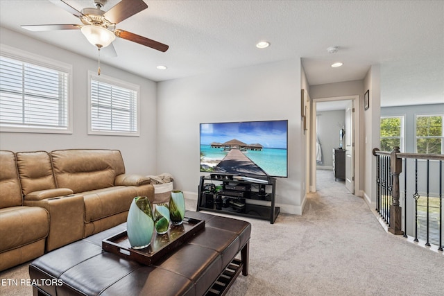 1682 Hickory Reserve Rd, Knoxville, TN 37932 - carpeted living room with ceiling fan, recessed lighting, and a textured ceiling