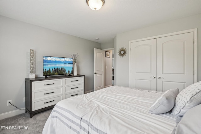 1682 Hickory Reserve Rd, Knoxville, TN 37932 - carpeted bedroom with a closet and baseboards