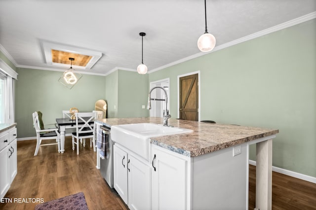 238 Mac Ivey Ln, Lafollette, TN 37766 - kitchen featuring stainless steel dishwasher, dark wood-style floors, white cabinets, crown molding, and hanging light fixtures