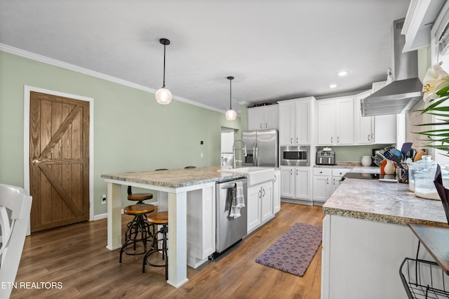 238 Mac Ivey Ln, Lafollette, TN 37766 - kitchen with stainless steel appliances, extractor fan, white cabinets, light countertops, and ornamental molding