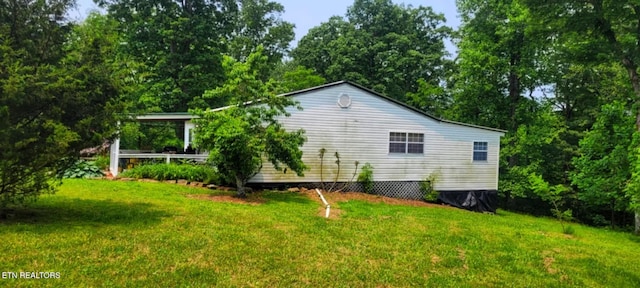 1591 Big Ridge Rd, Spring City, TN 37381 - view of property exterior featuring a yard