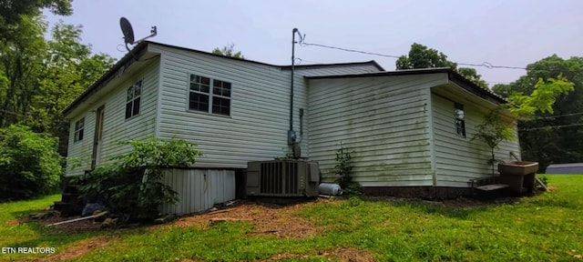 1591 Big Ridge Rd, Spring City, TN 37381 - view of home's exterior featuring a cooling unit and a yard
