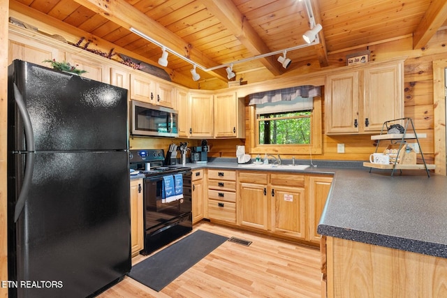 2217 Red Bud Rd, Sevierville, TN 37876 - kitchen with black appliances, rail lighting, a wood ceiling with exposed beams, light brown cabinetry, and light wood-type flooring