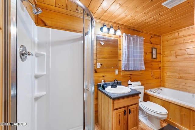 2217 Red Bud Rd, Sevierville, TN 37876 - full bath with a stall shower, vanity, wood ceiling, a tub to relax in, and wood walls