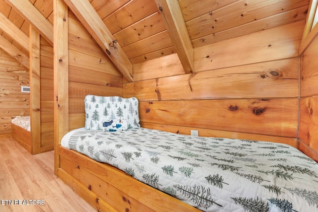 2217 Red Bud Rd, Sevierville, TN 37876 - bedroom with wood finished floors, wooden ceiling, and wood walls