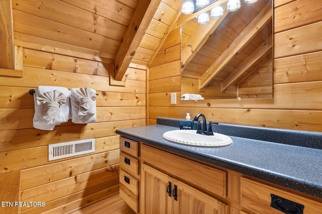 2217 Red Bud Rd, Sevierville, TN 37876 - bathroom with wood ceiling, wooden walls, and vanity