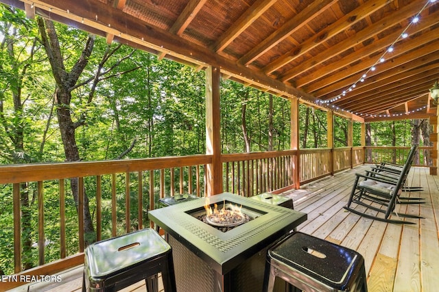 2217 Red Bud Rd, Sevierville, TN 37876 - deck featuring an outdoor fire pit