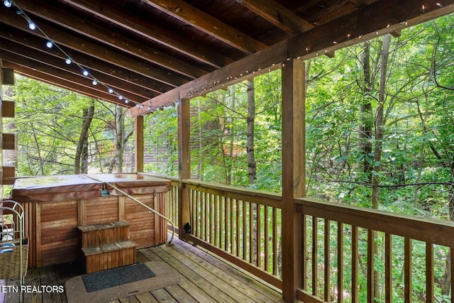 2217 Red Bud Rd, Sevierville, TN 37876 - wooden terrace featuring a hot tub and a view of trees