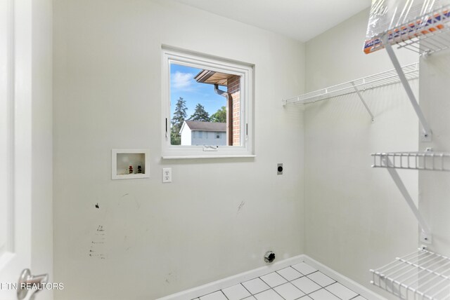 8808 Cedar Springs Ln, Knoxville, TN 37923 - washroom with hookup for an electric dryer, hookup for a washing machine, and light tile patterned flooring