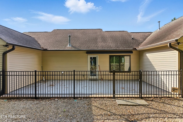 8808 Cedar Springs Ln, Knoxville, TN 37923 - back of house featuring a patio and roof with shingles