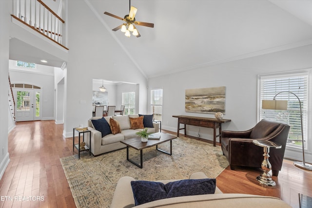 1269 Bentley Park Ln, Knoxville, TN 37922 - living room with high vaulted ceiling, wood finished floors, a ceiling fan, and crown molding