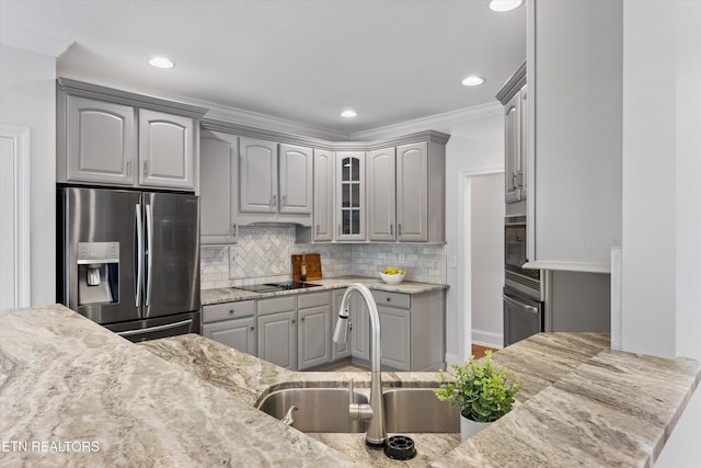 1269 Bentley Park Ln, Knoxville, TN 37922 - kitchen featuring stainless steel refrigerator with ice dispenser, gray cabinetry, backsplash, light stone countertops, and recessed lighting