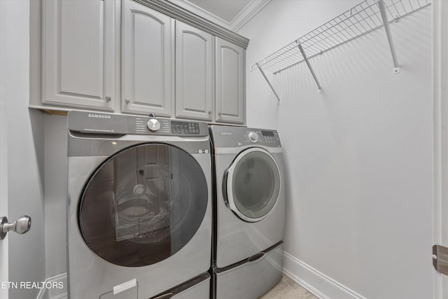 1269 Bentley Park Ln, Knoxville, TN 37922 - laundry area with washing machine and clothes dryer, cabinet space, and crown molding