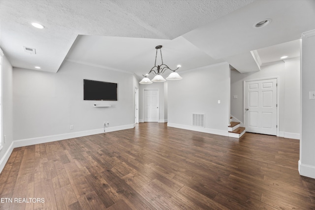 1269 Bentley Park Ln, Knoxville, TN 37922 - unfurnished living room featuring dark wood-style floors, stairway, a chandelier, recessed lighting, and ornamental molding