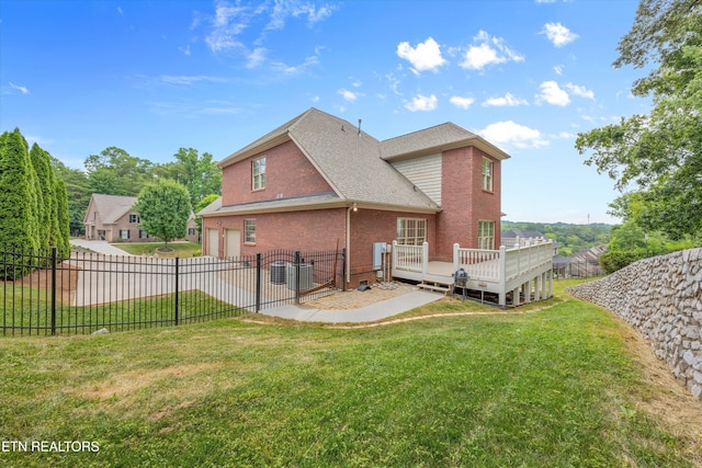 1269 Bentley Park Ln, Knoxville, TN 37922 - back of property with an attached garage, brick siding, a wooden deck, a shingled roof, and a gate