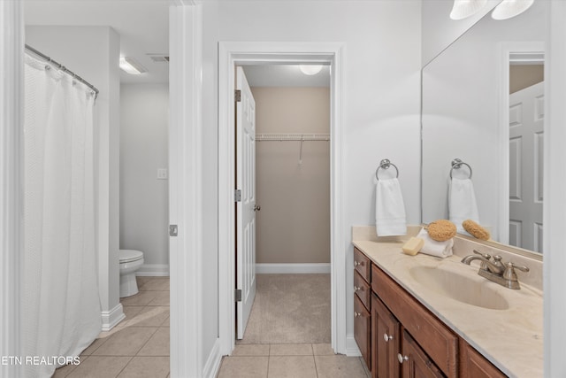 1269 Bentley Park Ln, Knoxville, TN 37922 - full bathroom with tile patterned floors, vanity, a spacious closet, and a shower with curtain