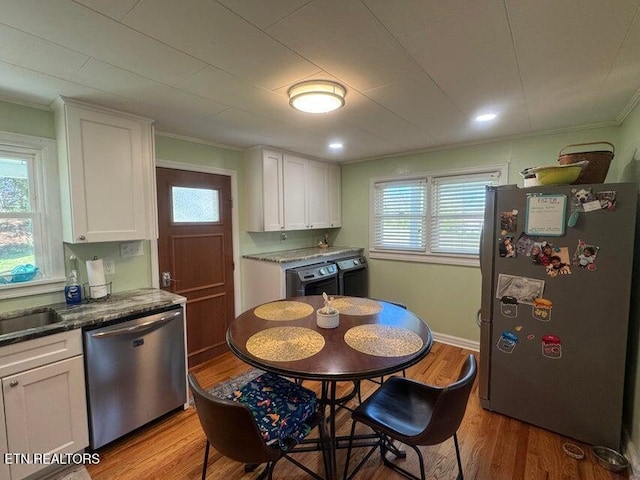 3207 Dove Ln, White Pine, TN 37890 - kitchen with appliances with stainless steel finishes, ornamental molding, white cabinetry, light wood-style flooring, and recessed lighting