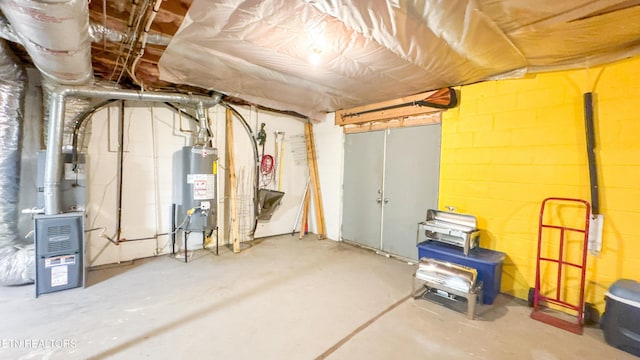 1517 Randal Park Dr, Knoxville, TN 37922 - unfinished below grade area with water heater and concrete block wall