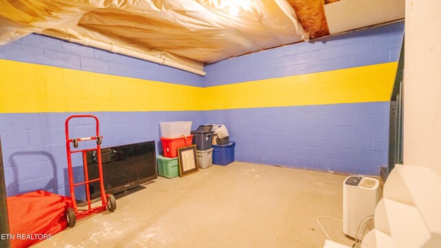 1517 Randal Park Dr, Knoxville, TN 37922 - miscellaneous room featuring concrete flooring and concrete block wall