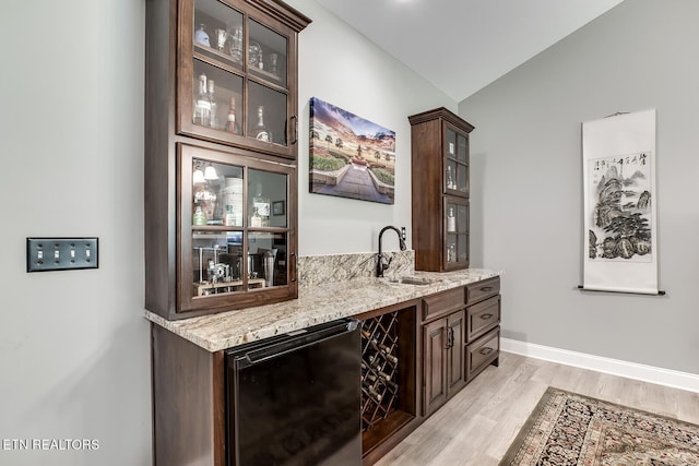 129 Dudi Trl, Vonore, TN 37885 - indoor wet bar featuring light wood-style flooring, lofted ceiling, and refrigerator