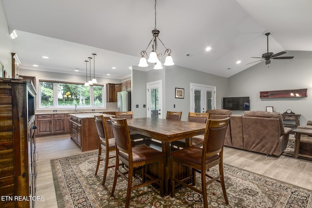 129 Dudi Trl, Vonore, TN 37885 - dining room with light wood-type flooring, lofted ceiling, recessed lighting, a chandelier, and a ceiling fan