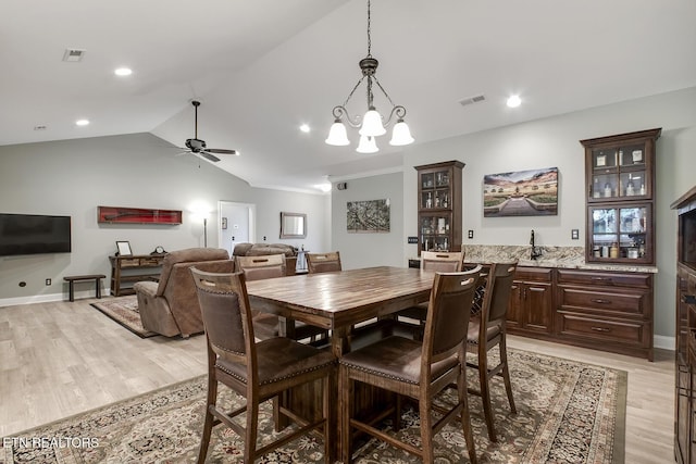 129 Dudi Trl, Vonore, TN 37885 - dining space with light wood-type flooring, ceiling fan, lofted ceiling, a chandelier, and recessed lighting