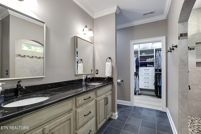 129 Dudi Trl, Vonore, TN 37885 - bathroom featuring double vanity, a shower stall, crown molding, a spacious closet, and tile patterned floors