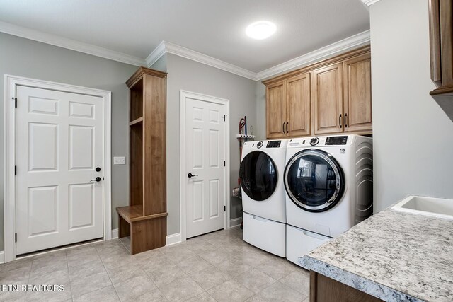 129 Dudi Trl, Vonore, TN 37885 - washroom featuring cabinet space, separate washer and dryer, crown molding, and light tile patterned floors