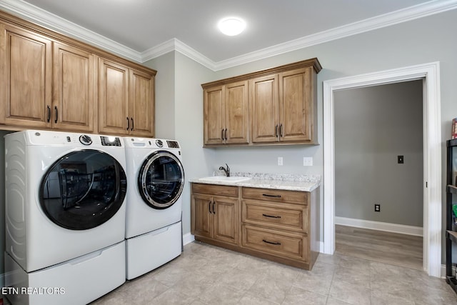 129 Dudi Trl, Vonore, TN 37885 - laundry area featuring cabinet space, washer and dryer, and ornamental molding