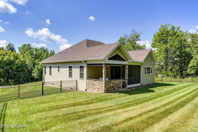 129 Dudi Trl, Vonore, TN 37885 - rear view of house featuring roof with shingles, stone siding, and a fenced backyard