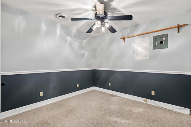 10609 Sprawls Pt, Knoxville, TN 37932 - unfurnished room with electric panel, a ceiling fan, and carpet