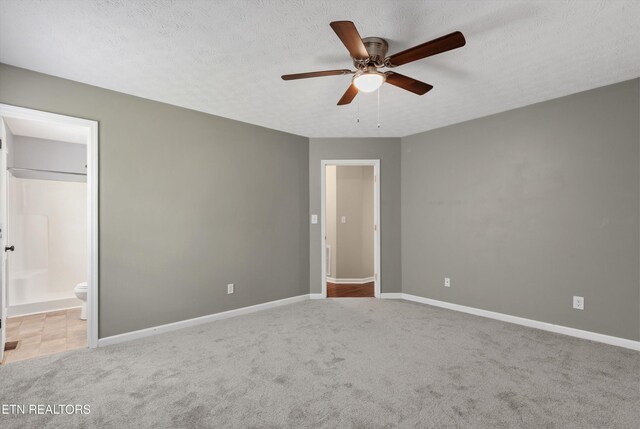 10609 Sprawls Pt, Knoxville, TN 37932 - unfurnished bedroom featuring carpet, ensuite bathroom, and a ceiling fan