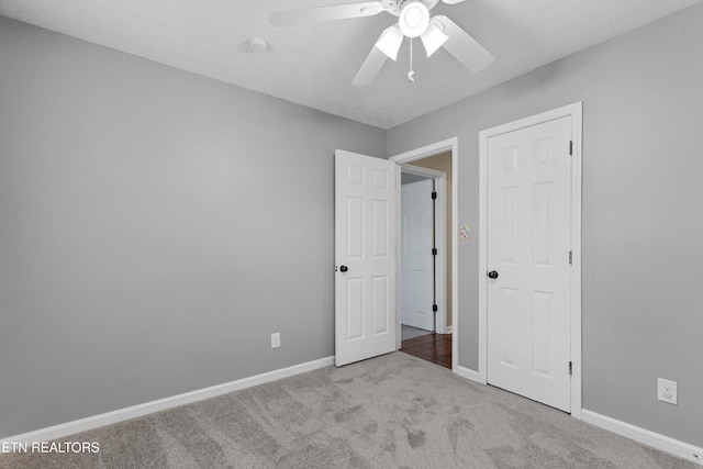 10609 Sprawls Pt, Knoxville, TN 37932 - unfurnished bedroom featuring carpet floors and a ceiling fan