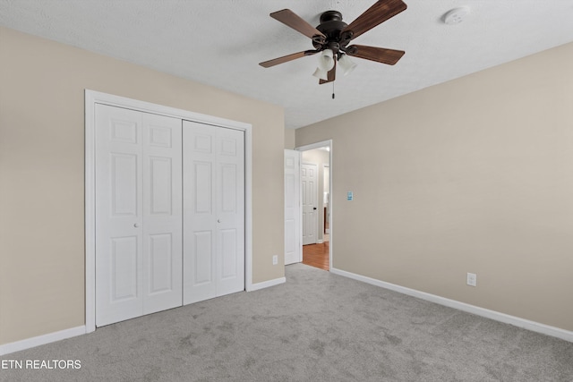 10609 Sprawls Pt, Knoxville, TN 37932 - unfurnished bedroom with carpet flooring, a closet, and ceiling fan