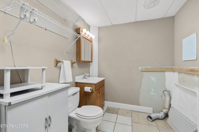 10609 Sprawls Pt, Knoxville, TN 37932 - bathroom with vanity, tile patterned flooring, and a paneled ceiling