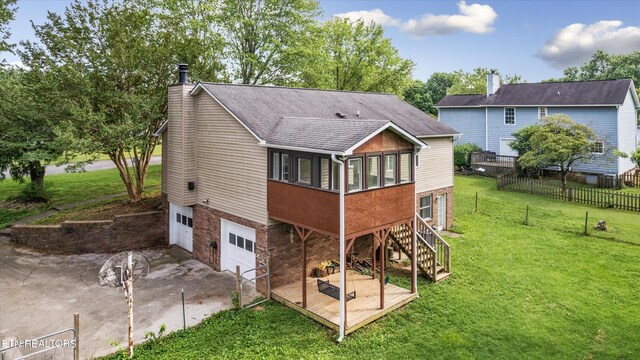 10609 Sprawls Pt, Knoxville, TN 37932 - rear view of property featuring concrete driveway, a garage, stairs, a chimney, and a deck