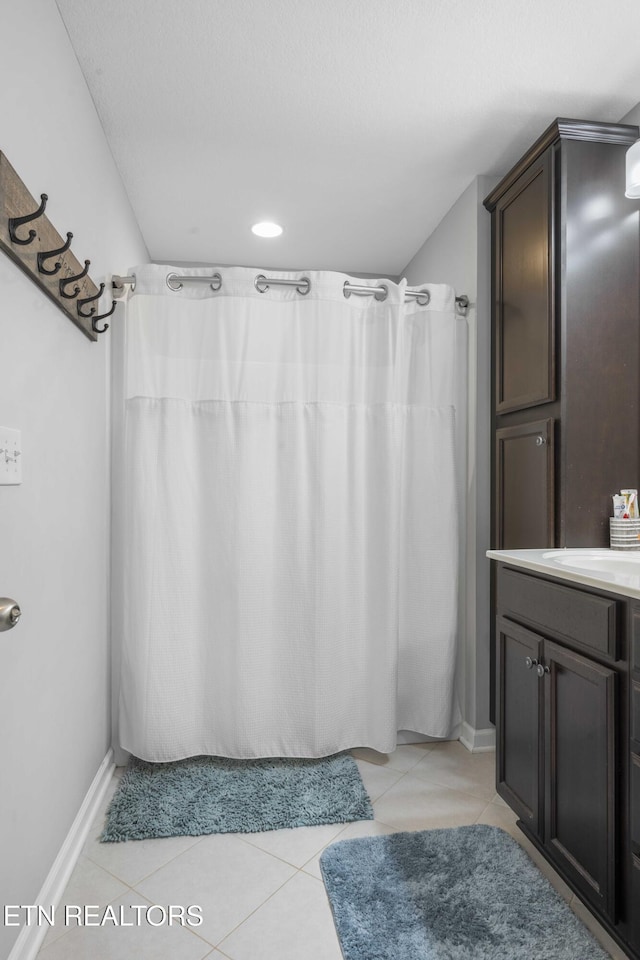 10703 Grantham Ln, Knoxville, TN 37932 - bathroom with vanity, tile patterned floors, a shower with shower curtain, and recessed lighting