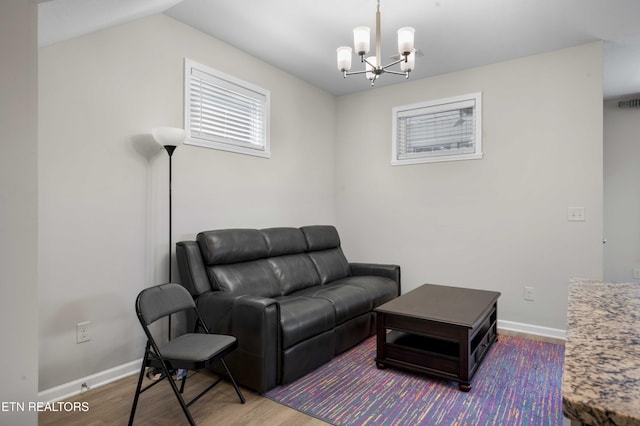 10703 Grantham Ln, Knoxville, TN 37932 - living area with a chandelier and wood finished floors
