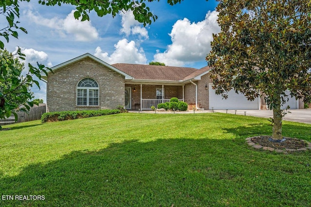 674 Southview Cir, Kodak, TN 37764 - ranch-style house featuring covered porch, brick siding, concrete driveway, and a garage