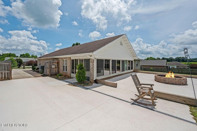 674 Southview Cir, Kodak, TN 37764 - rear view of property featuring a fire pit and a patio