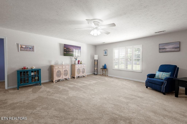 674 Southview Cir, Kodak, TN 37764 - sitting room featuring a ceiling fan, carpet flooring, and a textured ceiling