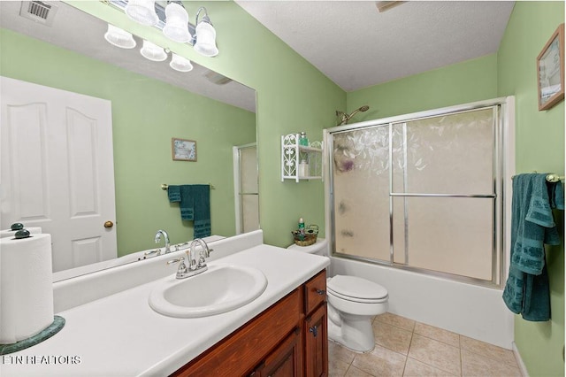 674 Southview Cir, Kodak, TN 37764 - full bathroom with vanity, enclosed tub / shower combo, tile patterned flooring, and a textured ceiling