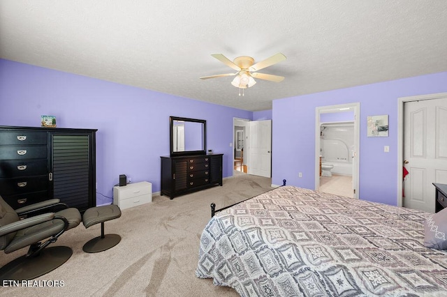 674 Southview Cir, Kodak, TN 37764 - bedroom featuring carpet floors, connected bathroom, a ceiling fan, and a textured ceiling
