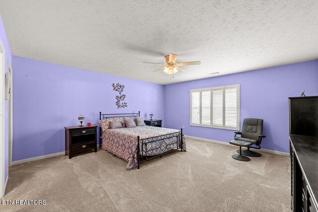 674 Southview Cir, Kodak, TN 37764 - bedroom with light carpet, ceiling fan, and a textured ceiling